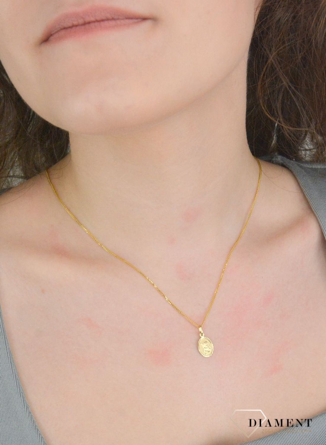 Zawieszka złota próba 375, anioł stróż ZA 1237A 375 Medalik będący wspaniałą pamiątką i prezentem z okazji chrztu, komunii czy bierzmowania. Zawieszka wykonana ze złota próby 375.1.jpg